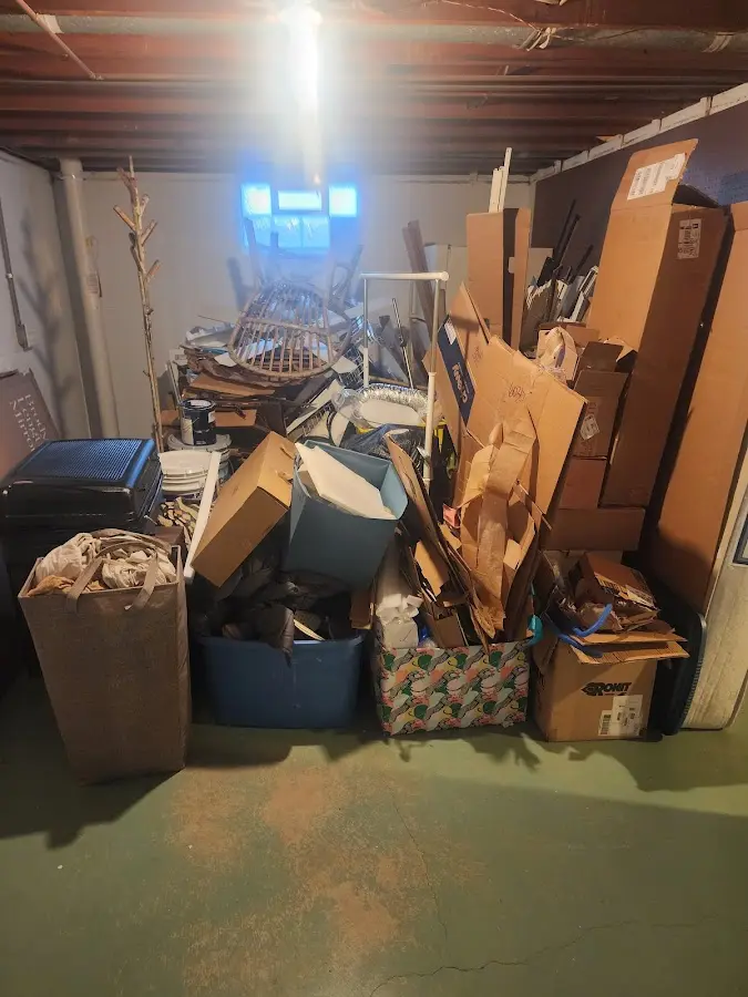 Roll-off dumpster container at job site for Yard Waste Dumpster Rental in Weaver